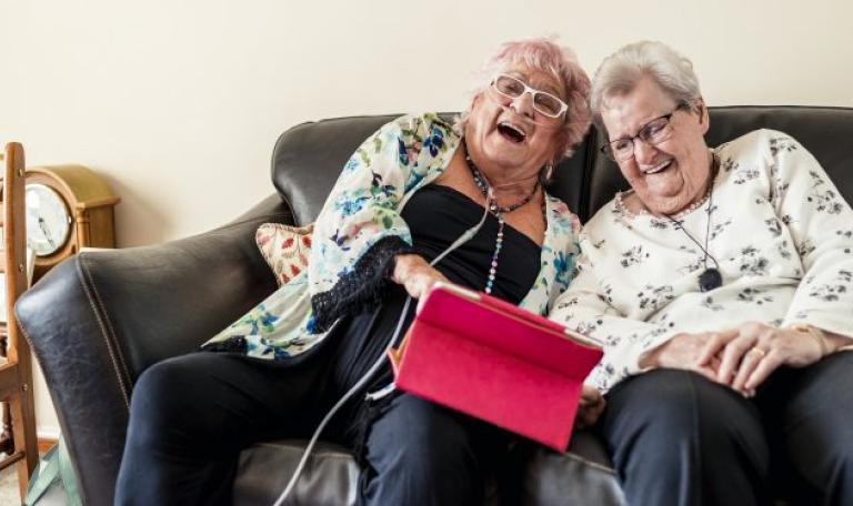 Two women laughing