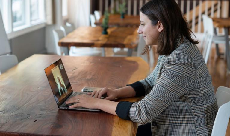 Woman watching online event