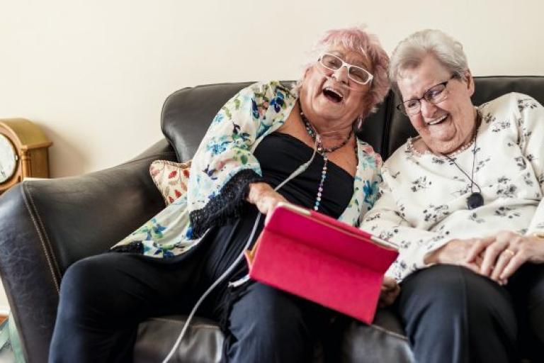 Two women laughing