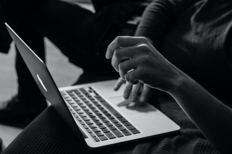 Image showing a laptop and hands